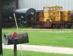 Bayou Railcar Services. This center cab has been in this same spot for a couple of years. Don't know if it runs or if they are consistent in the parking spot and used it to move cars. . Mailbox gives a glimpse into the location's history, as this is the e